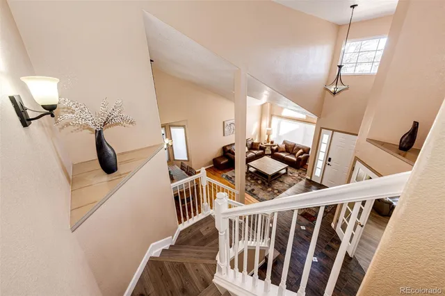 a view of entryway with wooden floor
