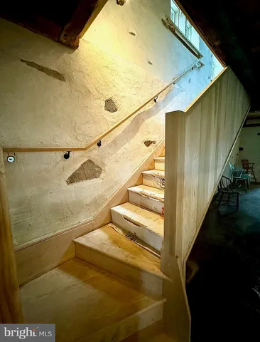 a view of a porch with wooden floor