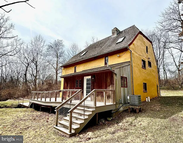 a view of swimming pool with a patio