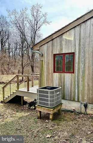 a view of swimming pool with a yard