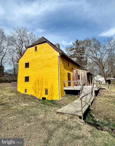 a view of a wooden street and trees