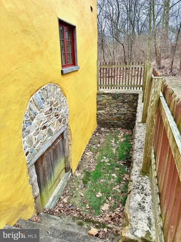 a view of a backyard of the house