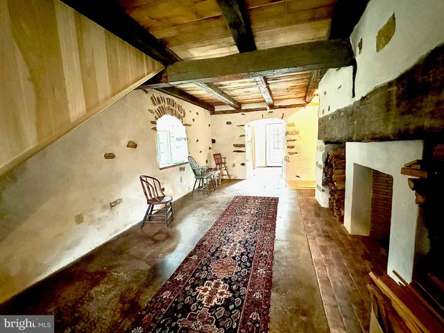 a hallway with sitting area