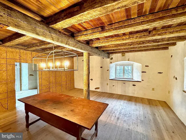 a kitchen with a wooden floor
