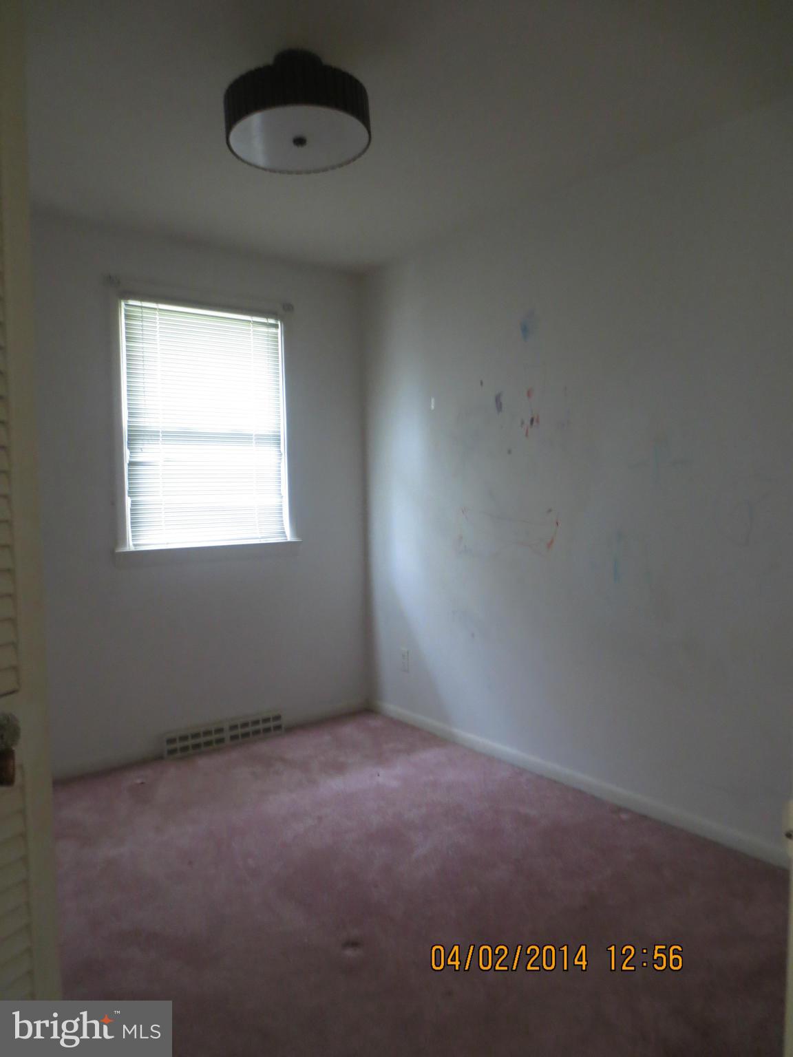 6796 Amherst Road Bryans Road, MD 20616 - Photo 7 of 10 an empty room with a window