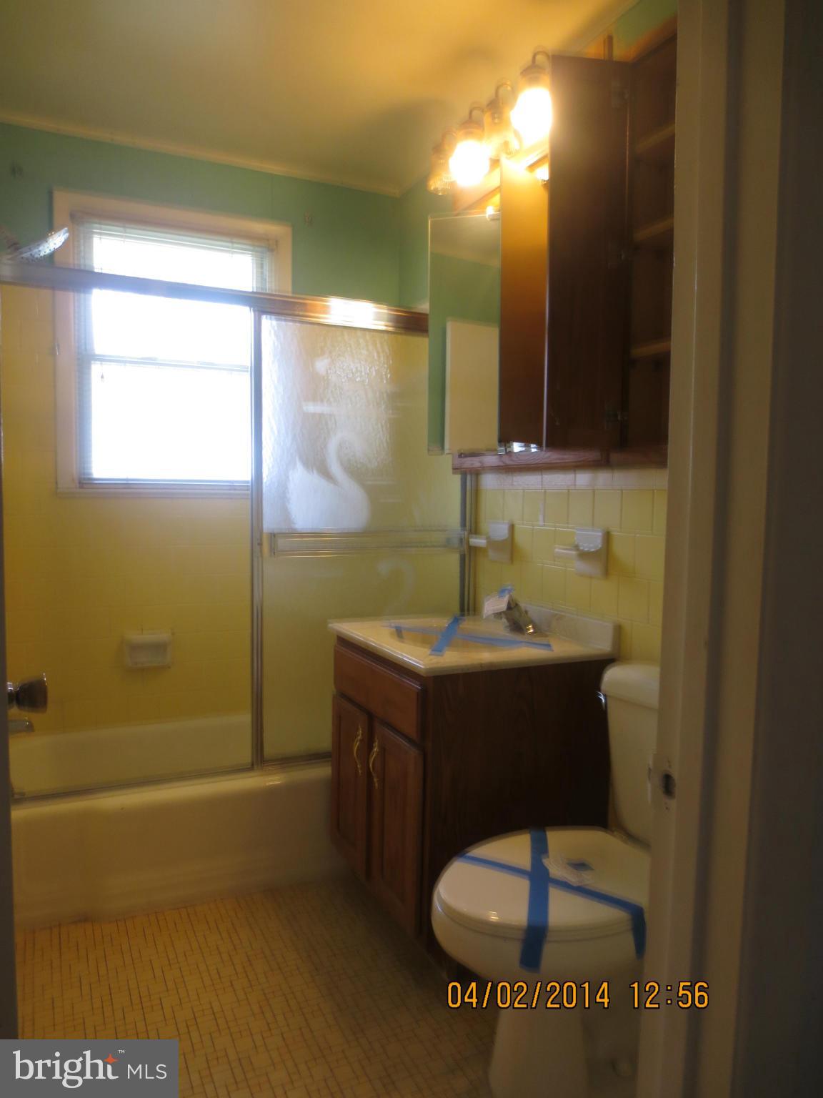6796 Amherst Road Bryans Road, MD 20616 - Photo 8 of 10 a bathroom with a sink and a mirror