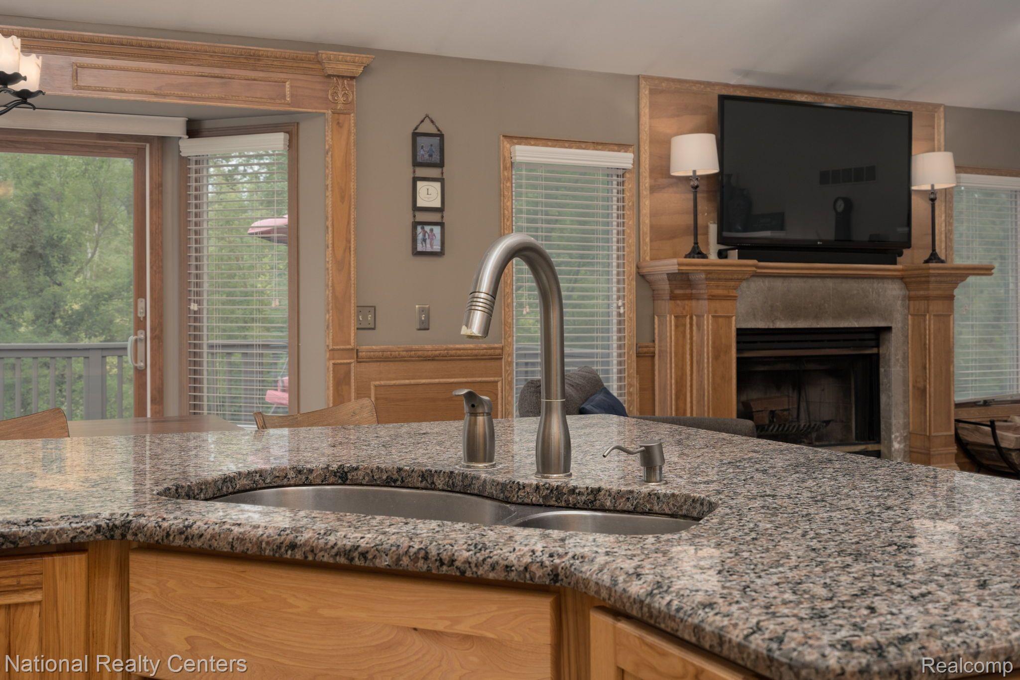 2814 Grouse Lane Rochester, MI 48306 - Photo 14 of 52 Sink in island is very convenient