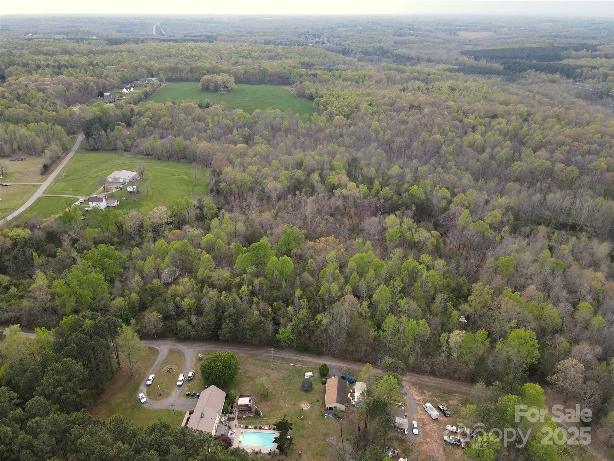 0 Fifth Creek Road Statesville, NC 28625 - Photo 18 of 43 an aerial view of field with trees
