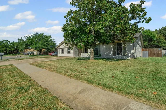 a house with trees in front of it