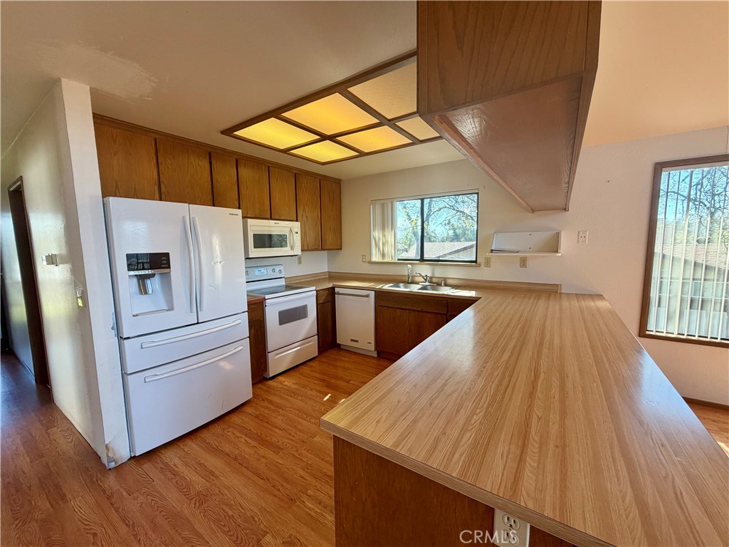 20764 Powder Horn Road Hidden Valley Lake, CA 95467 - Photo 11 of 27 a kitchen with a sink appliances and cabinets