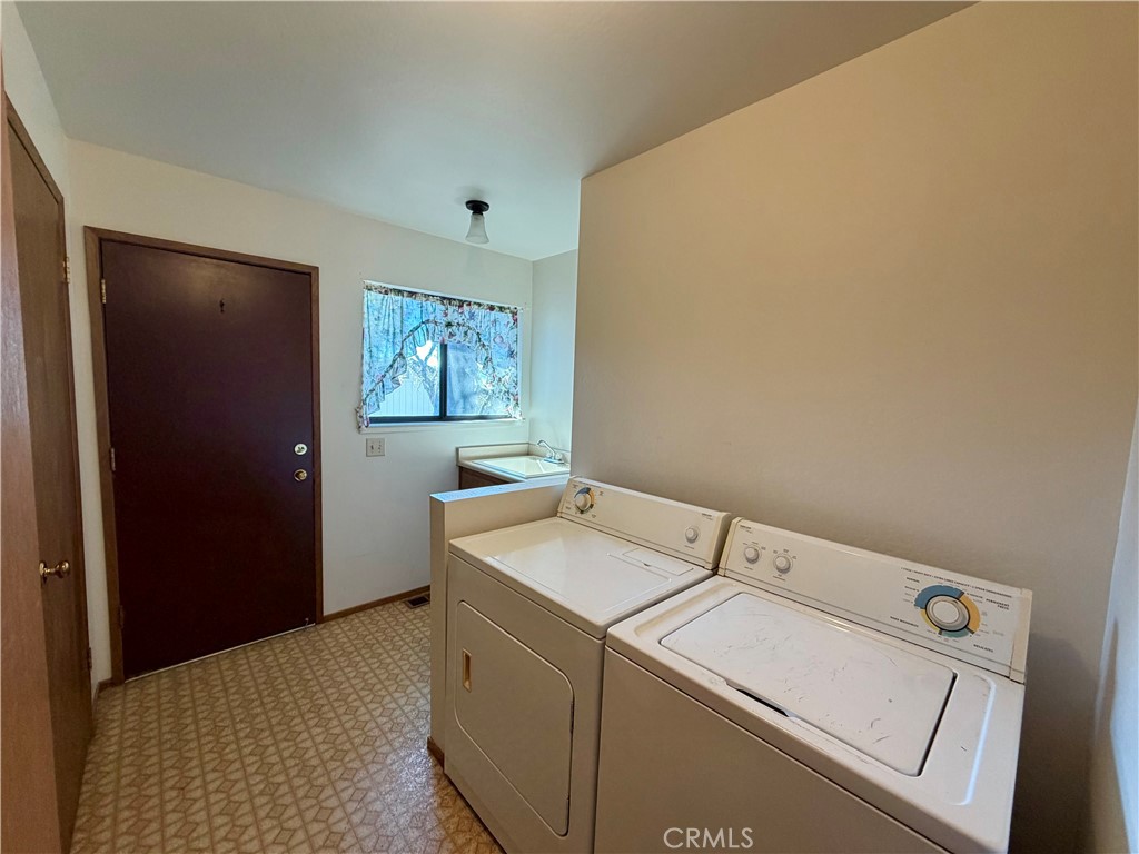 20764 Powder Horn Road Hidden Valley Lake, CA 95467 - Photo 13 of 27 a utility room with dryer and washer
