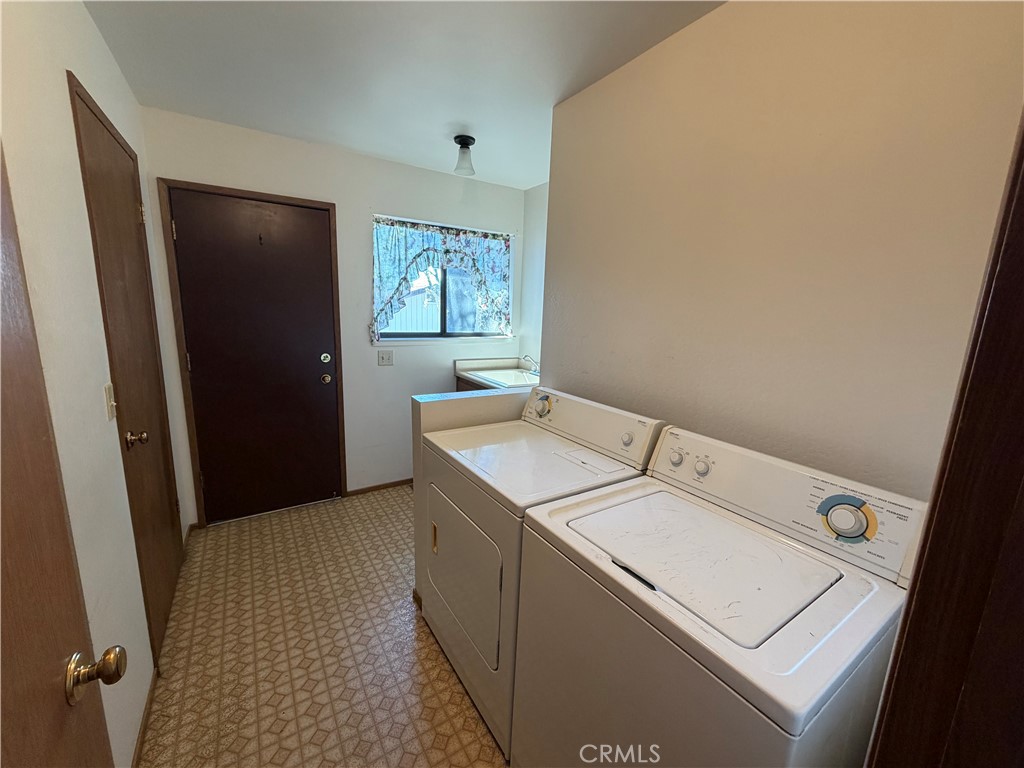 20764 Powder Horn Road Hidden Valley Lake, CA 95467 - Photo 20 of 27 a utility room with dryer and washer