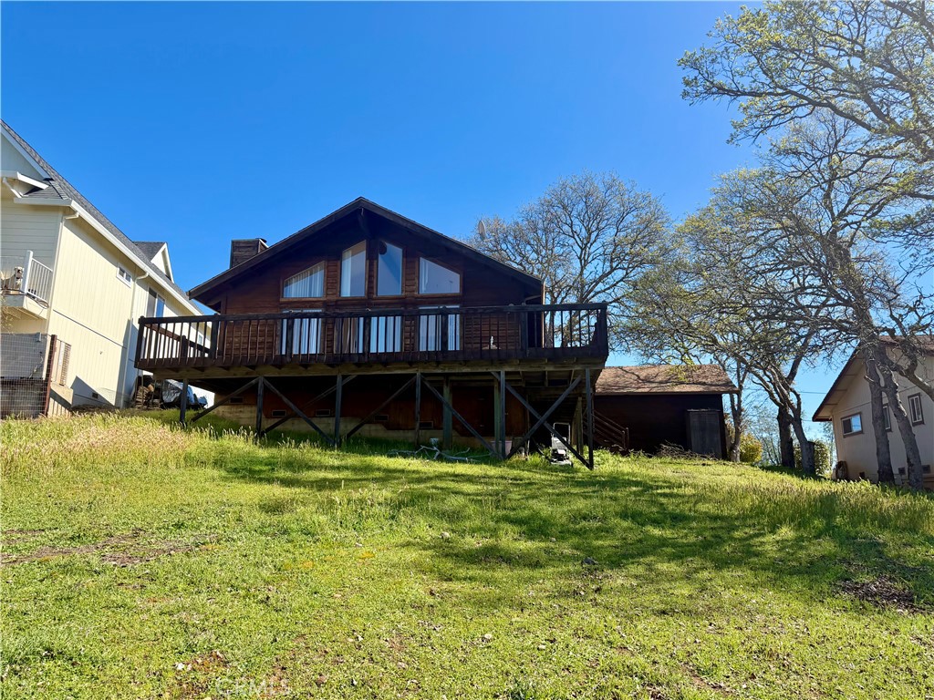 20764 Powder Horn Road Hidden Valley Lake, CA 95467 - Photo 23 of 27 a view of a house with a yard