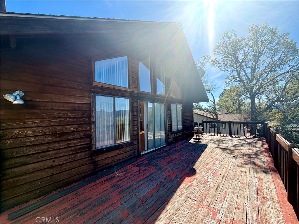 20764 Powder Horn Road Hidden Valley Lake, CA 95467 - Photo 24 of 27 a view of a house with a roof deck