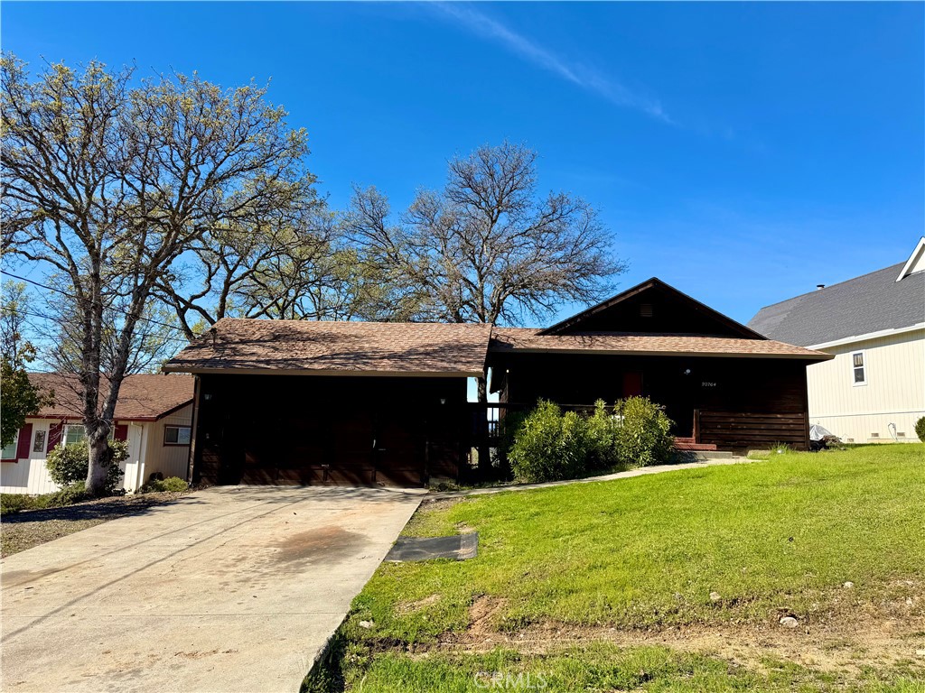 20764 Powder Horn Road Hidden Valley Lake, CA 95467 - Photo 27 of 27 a front view of a house with a yard