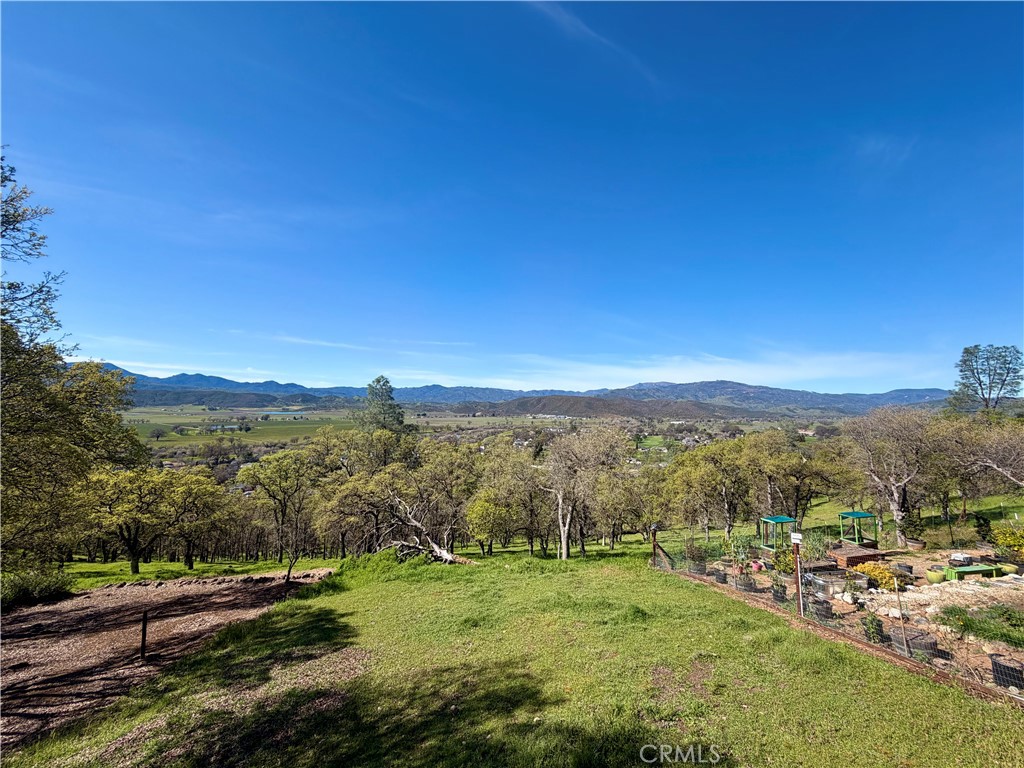 20764 Powder Horn Road Hidden Valley Lake, CA 95467 - Photo 3 of 27 a view of a city with lush green forest