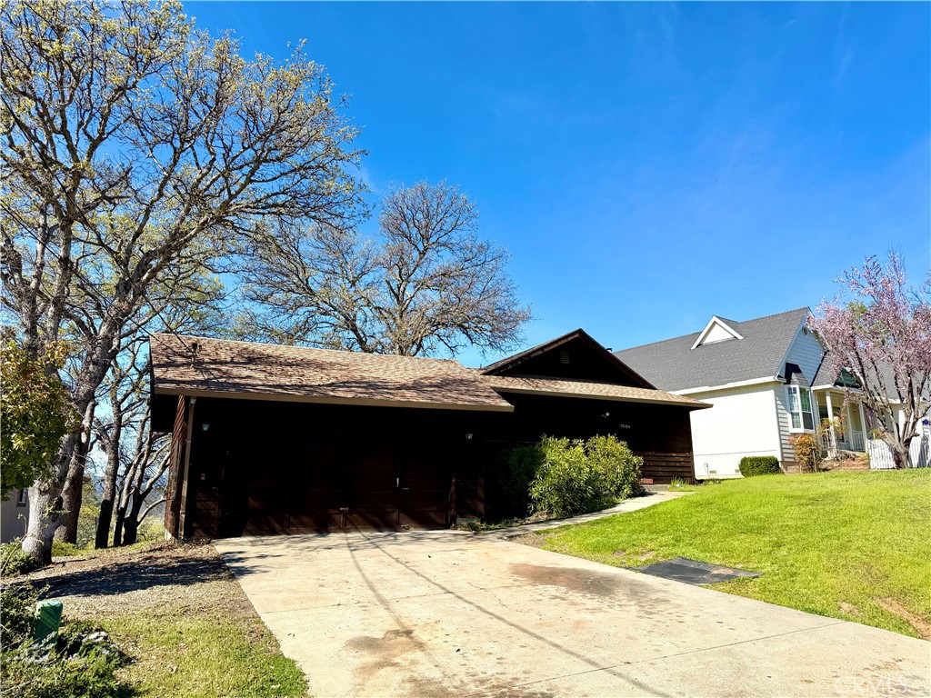20764 Powder Horn Road Hidden Valley Lake, CA 95467 - Photo 4 of 27 a front view of a house with a yard