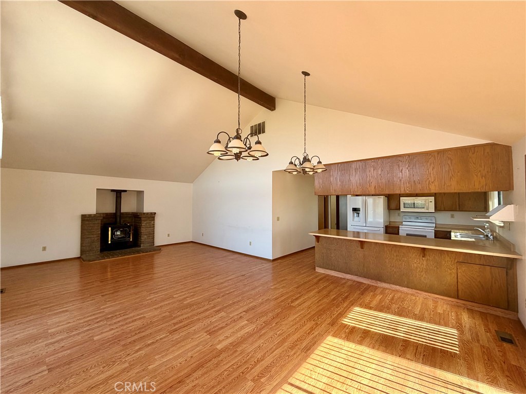 20764 Powder Horn Road Hidden Valley Lake, CA 95467 - Photo 7 of 27 a view of a kitchen with a sink and a stove