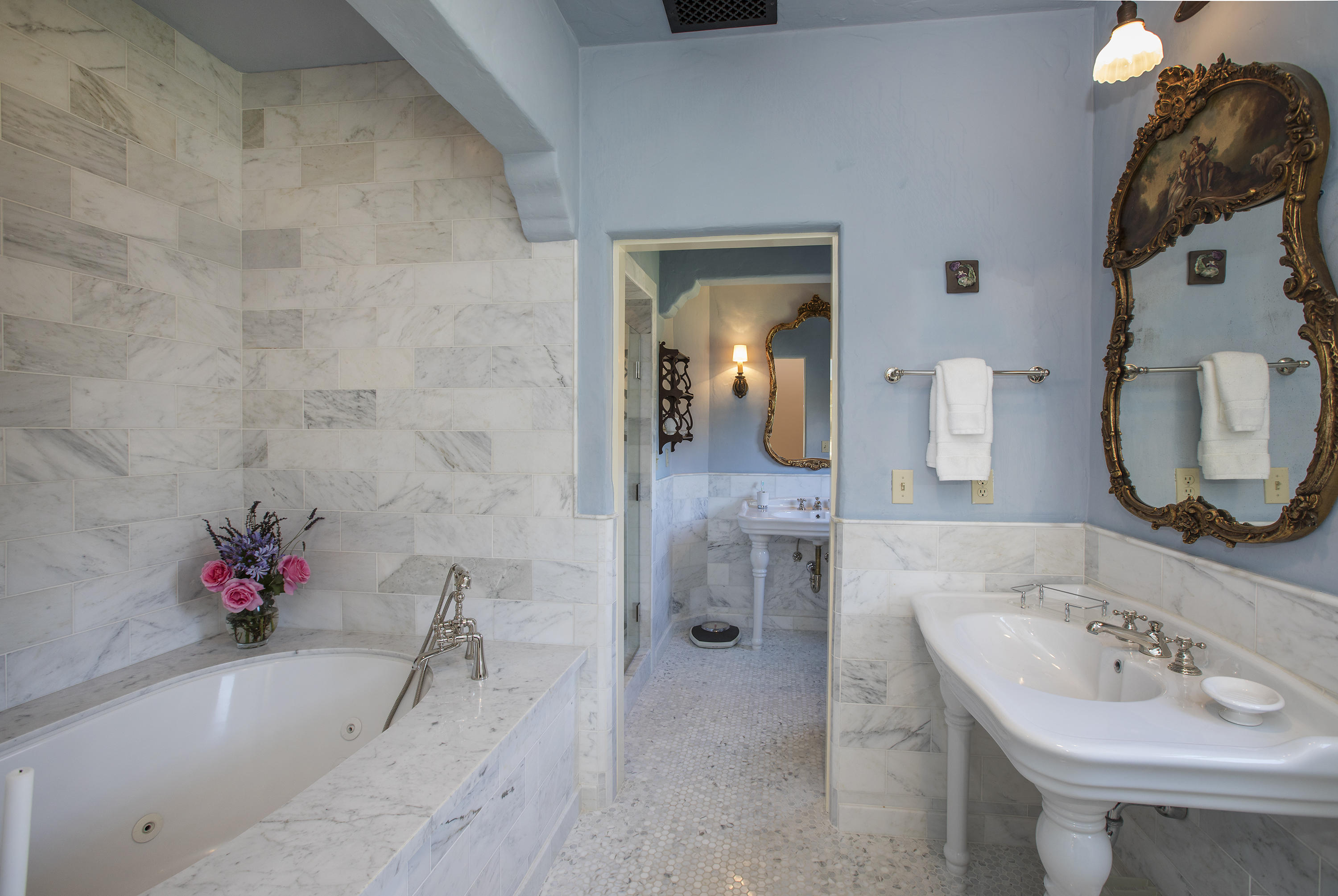 1525 Las Tunas Road Montecito, CA 93108 - Photo 14 of 28 a bathroom with a tub sink and mirror