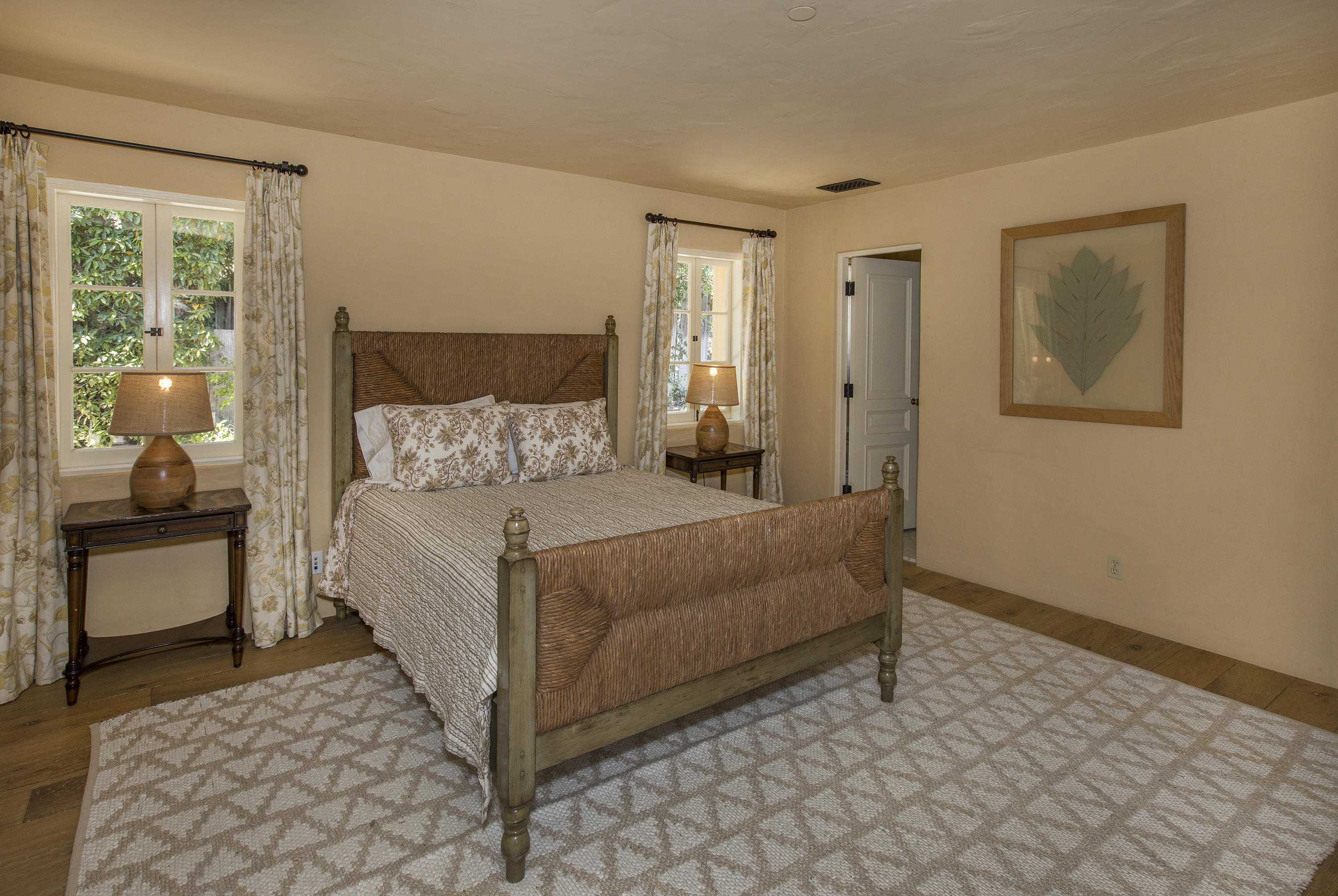 1525 Las Tunas Road Montecito, CA 93108 - Photo 15 of 28 a bedroom with a bed and window