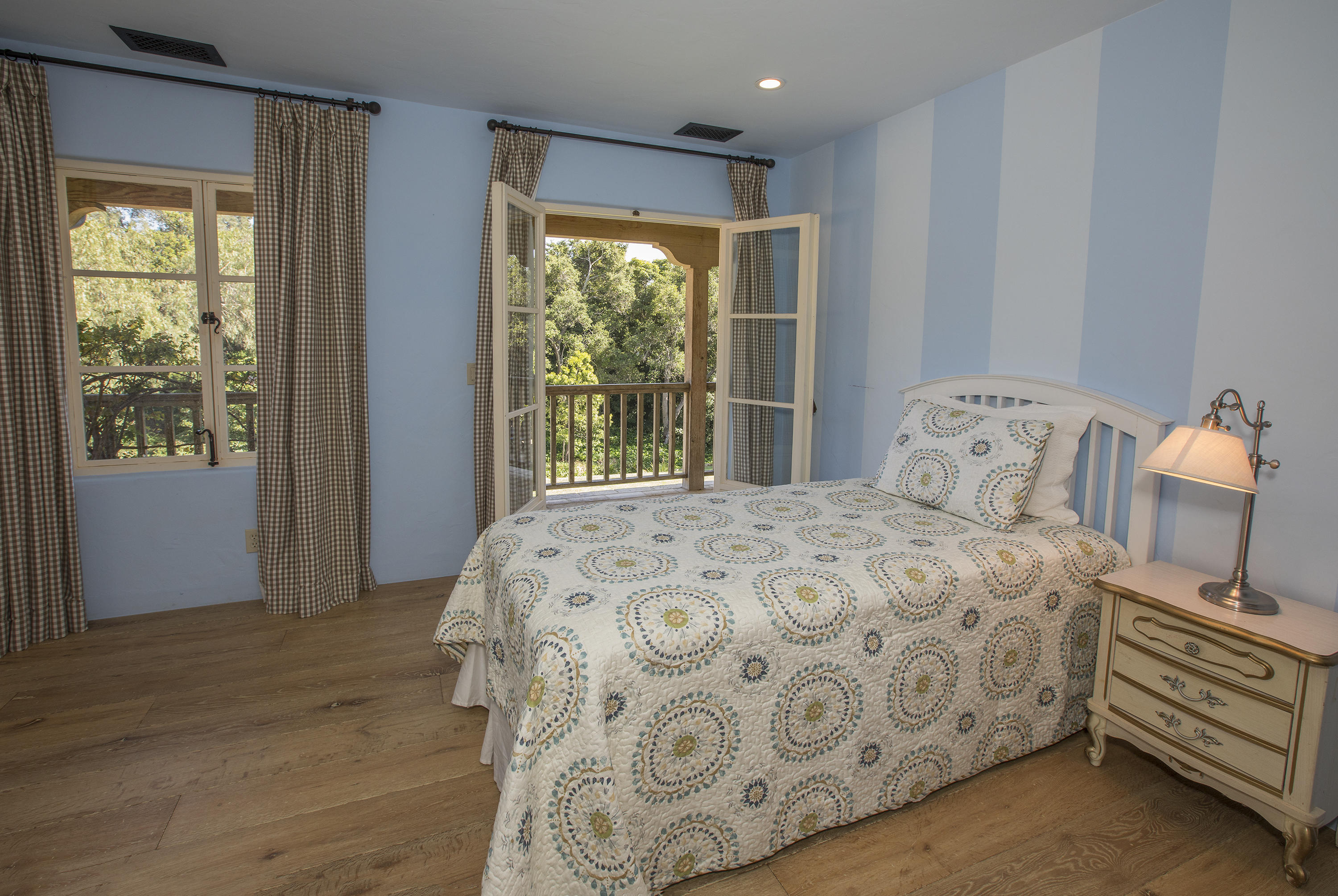 1525 Las Tunas Road Montecito, CA 93108 - Photo 17 of 28 a bedroom with a bed and a window