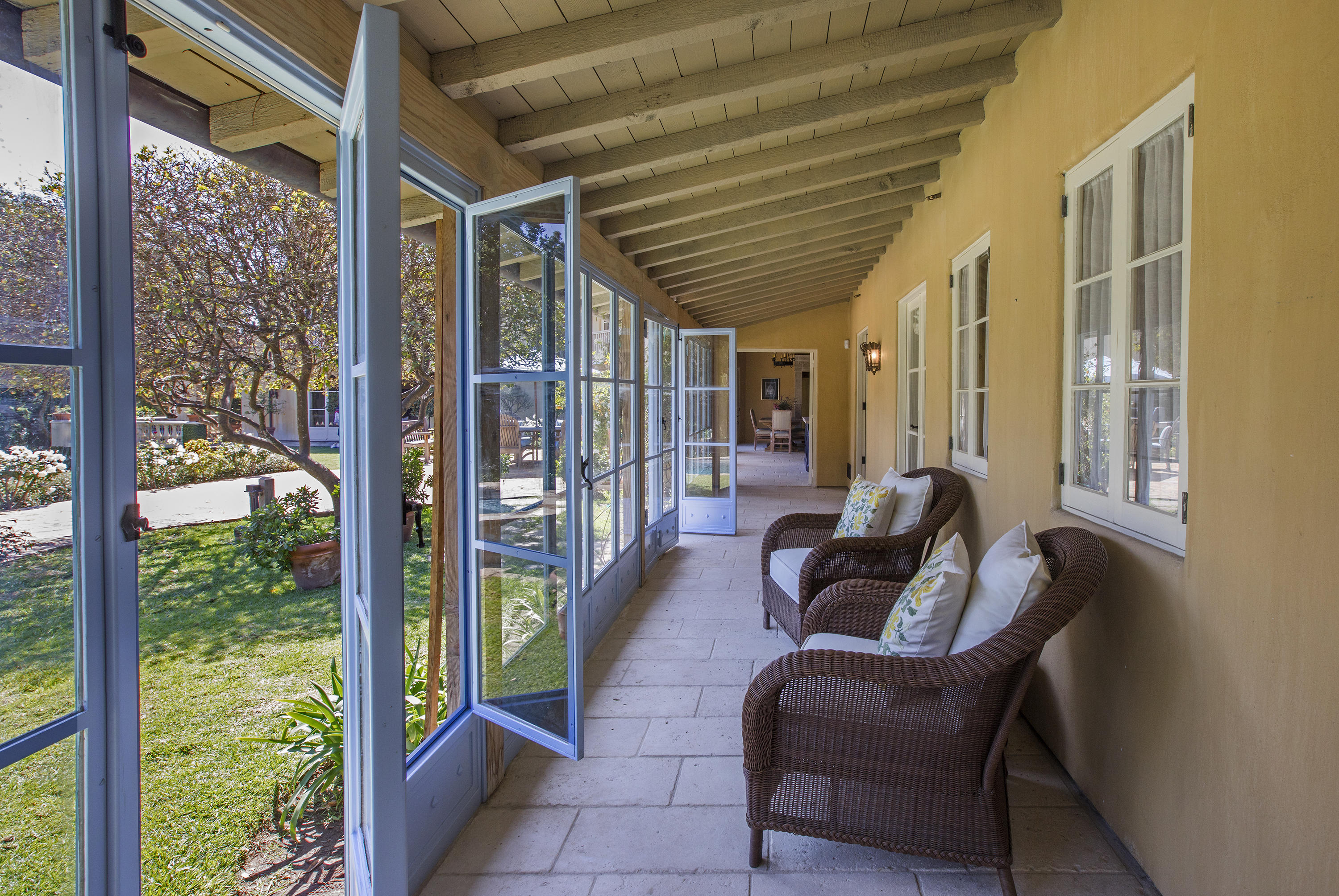 1525 Las Tunas Road Montecito, CA 93108 - Photo 19 of 28 a balcony with furniture and a potted plant