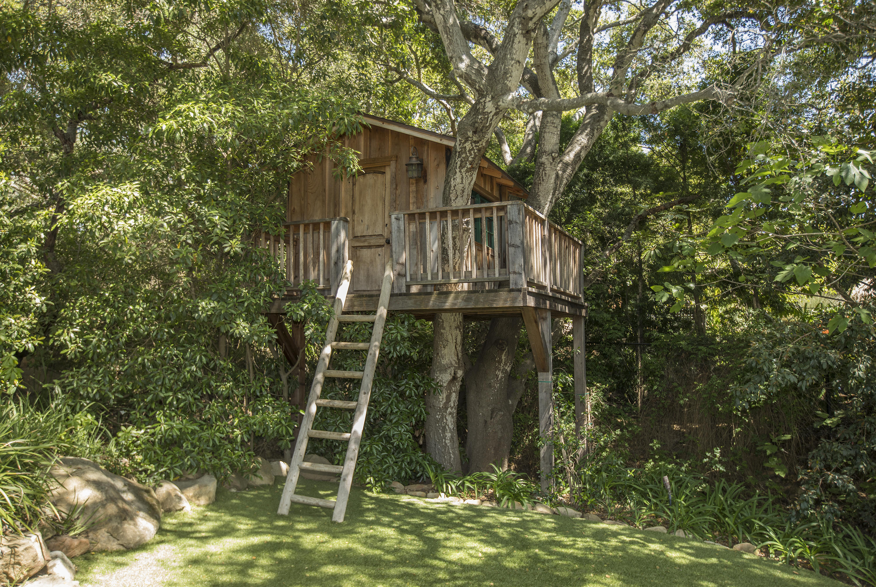 1525 Las Tunas Road Montecito, CA 93108 - Photo 23 of 28 a view of a wooden house with a small yard