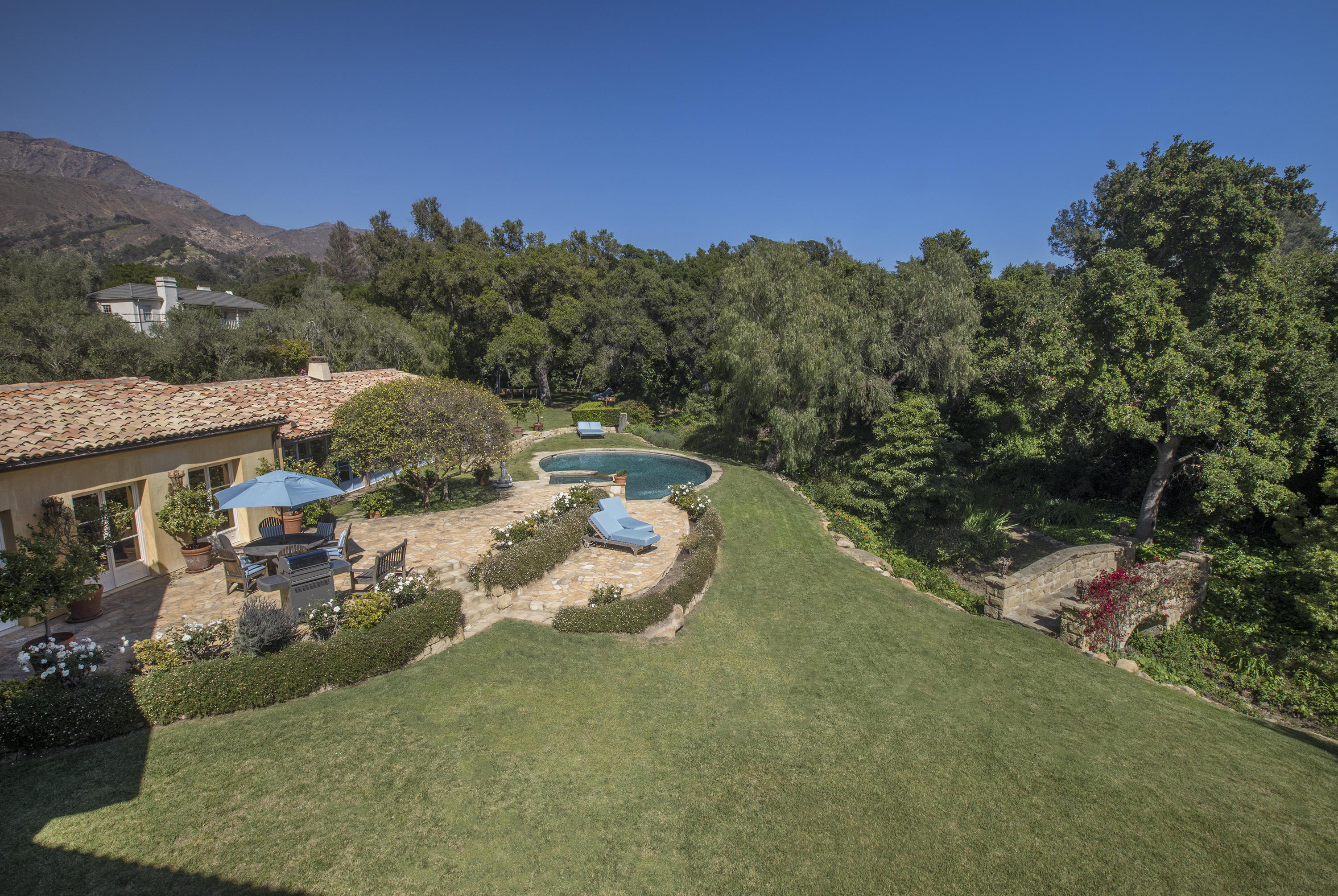 1525 Las Tunas Road Montecito, CA 93108 - Photo 27 of 28 a view of a garden with a houses