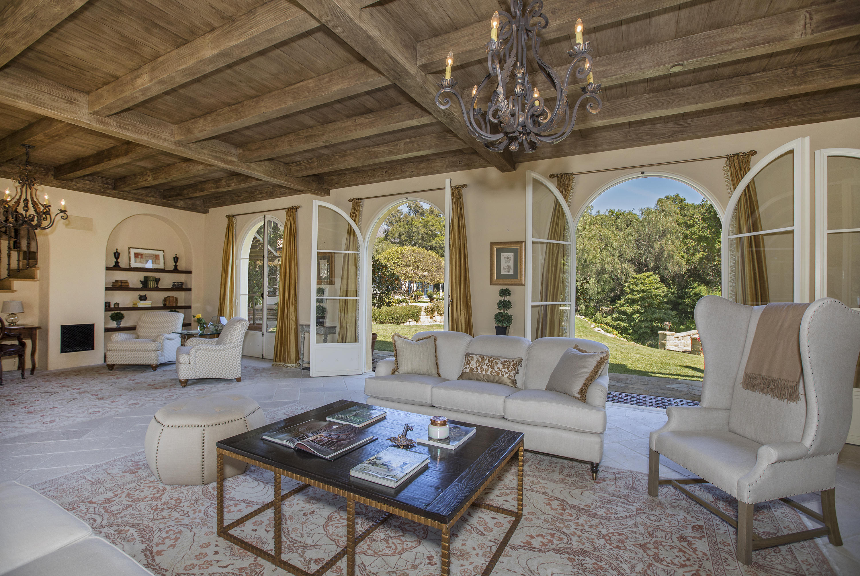 1525 Las Tunas Road Montecito, CA 93108 - Photo 4 of 28 a living room with furniture and a chandelier