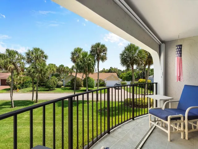 a view of a two chair in the balcony