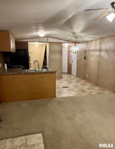 a view of a kitchen with a sink