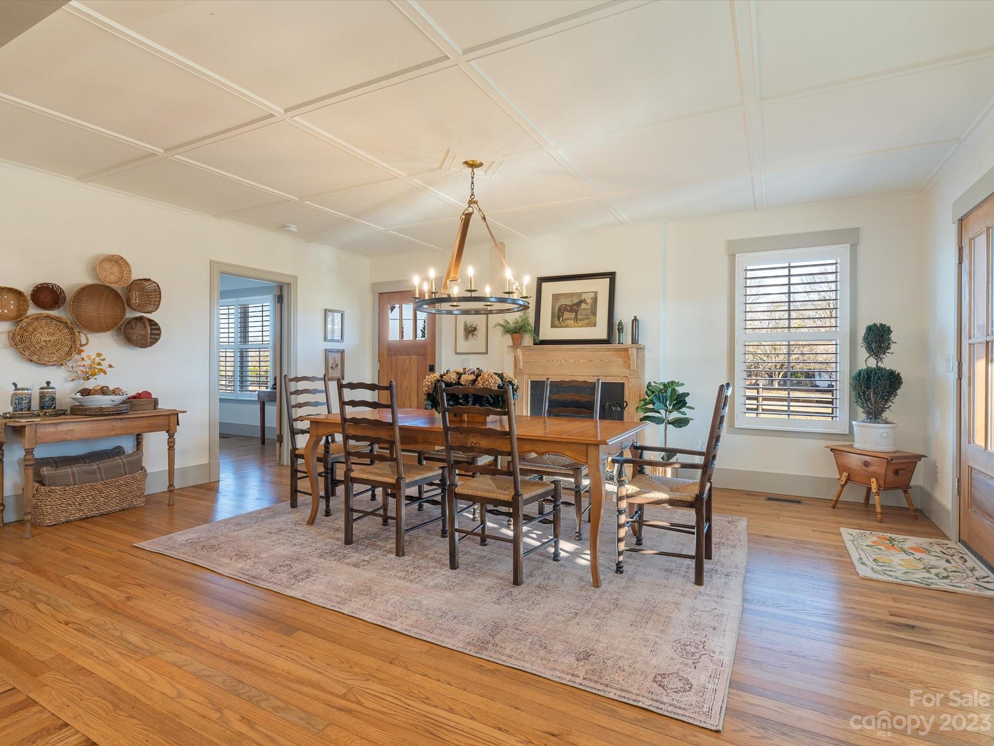 1032 Lawrence Road Clover, SC 29710 - Photo 9 of 48 a view of a dining room with furniture and wooden floor