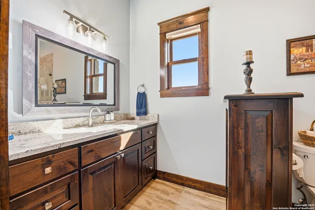 a view of a kitchen from a hallway