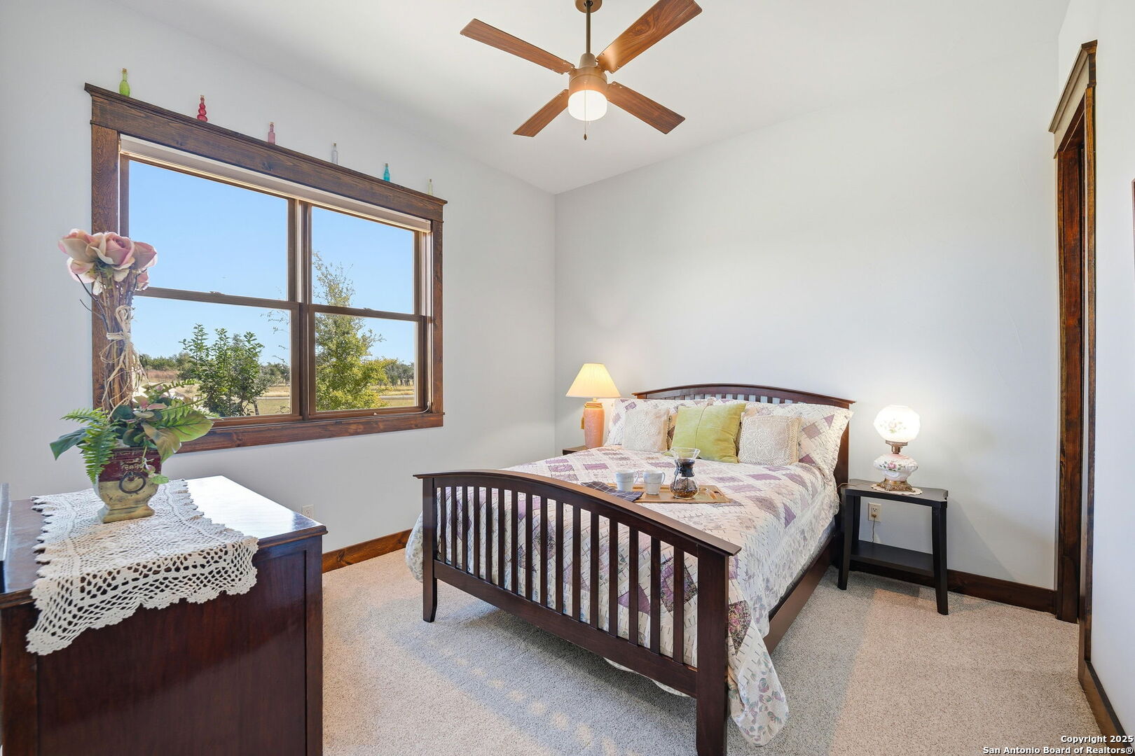 601 Garrison Road Fredericksburg, TX 78624 - Photo 37 of 77 a bedroom with a bed and a window