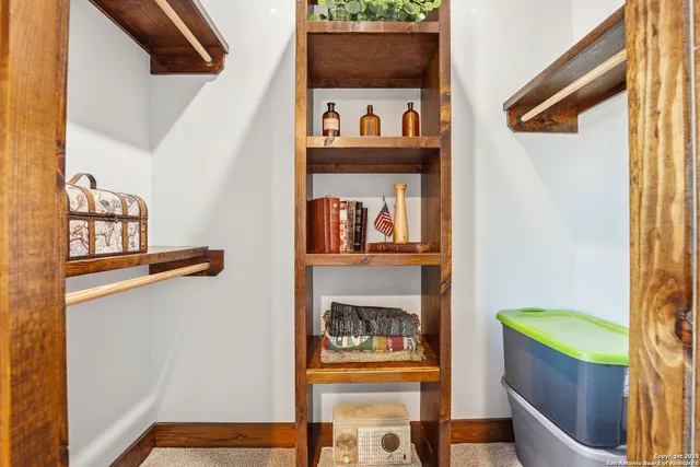a view of living room with patio furniture and a window