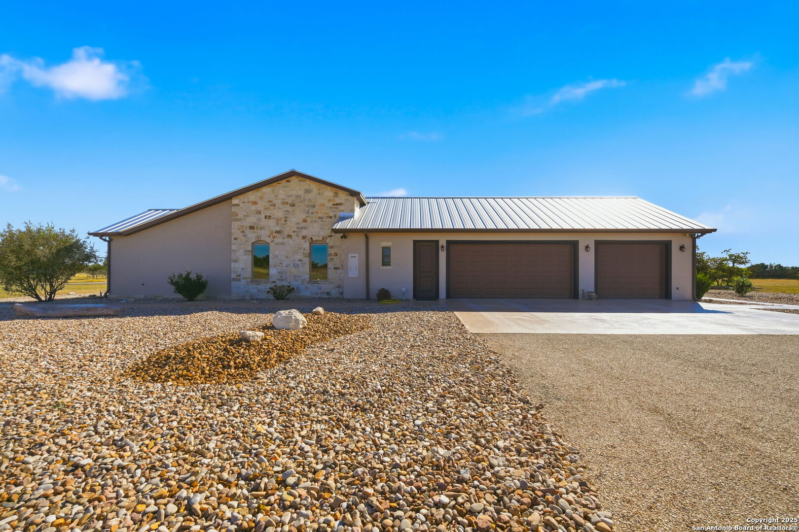 601 Garrison Road Fredericksburg, TX 78624 - Photo 47 of 77 a front view of a house with a yard
