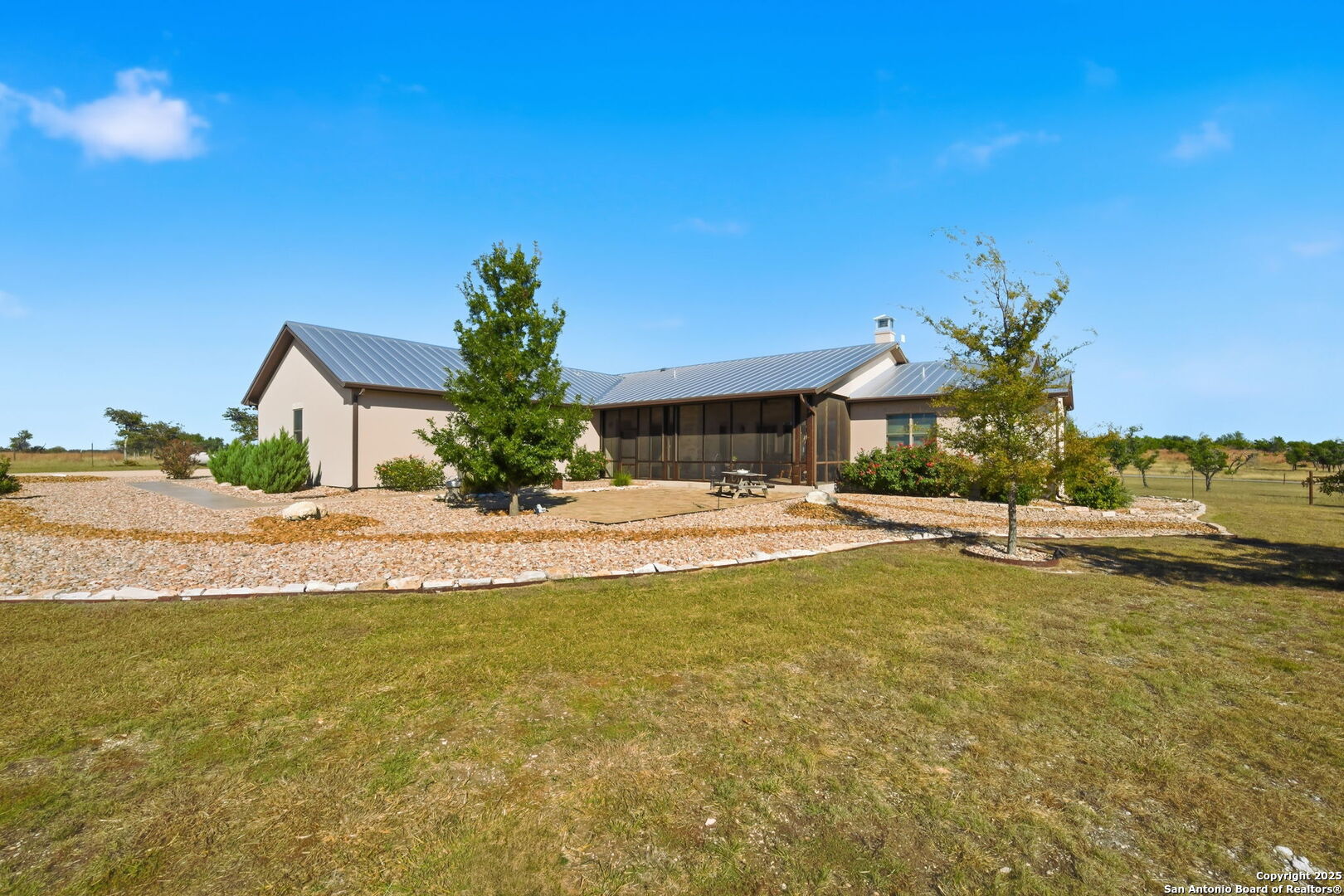 601 Garrison Road Fredericksburg, TX 78624 - Photo 54 of 77 a view of a house with a swimming pool