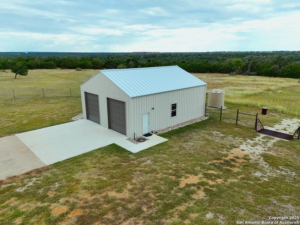 601 Garrison Road Fredericksburg, TX 78624 - Photo 61 of 77 a view of a big yard with an ocean view