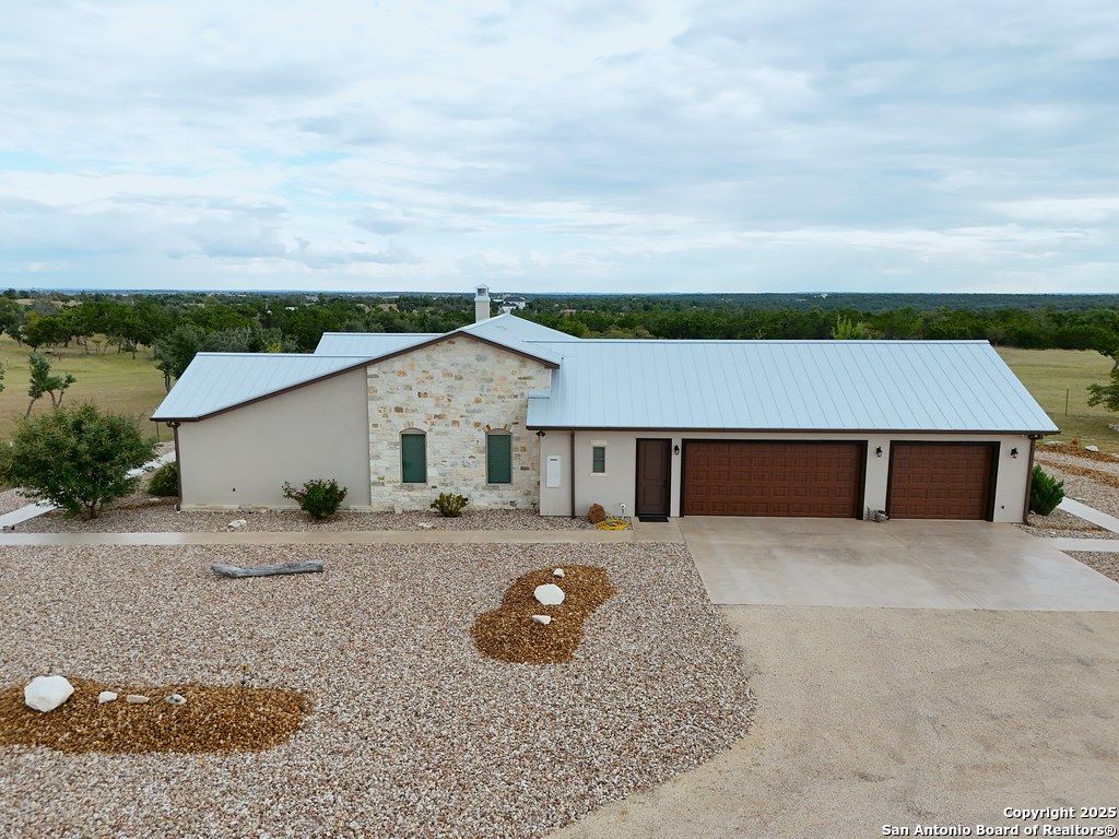 601 Garrison Road Fredericksburg, TX 78624 - Photo 66 of 77 front view of house with a yard
