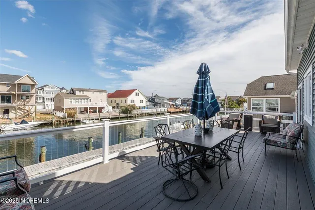 a bathroom with a sink mirror toilet and bathtub