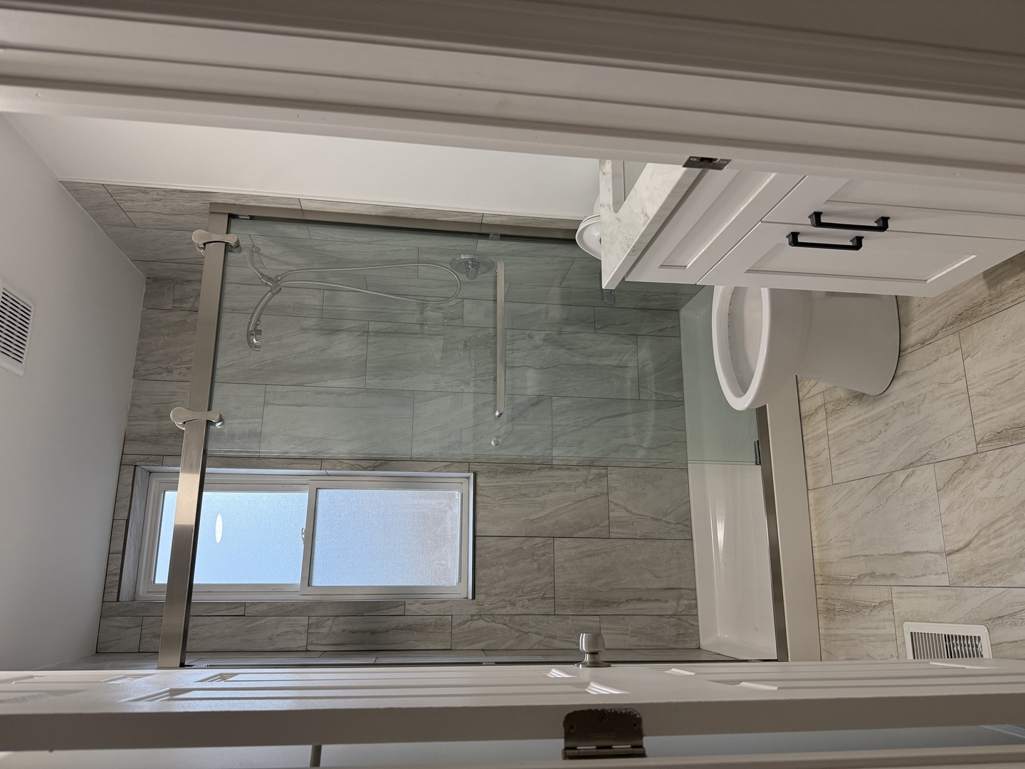 937 West 33rd Place, Unit 1F Chicago, IL 60608 - Photo 10 of 10 a bathroom with a shower