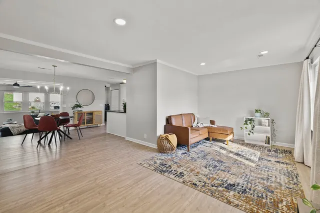 a living room with furniture and a table