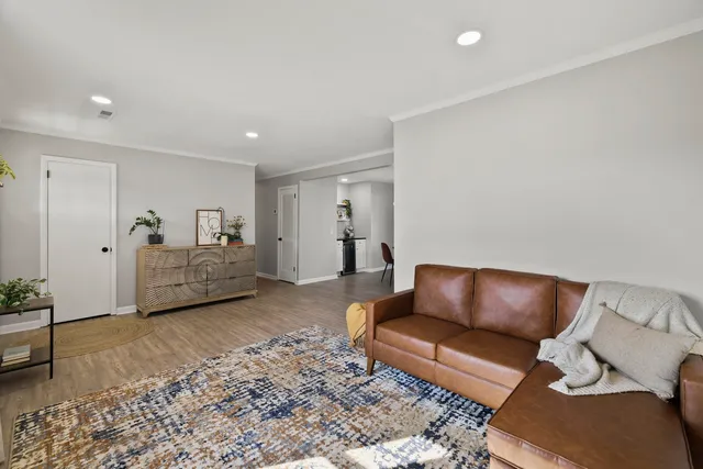 a living room with furniture and a couch