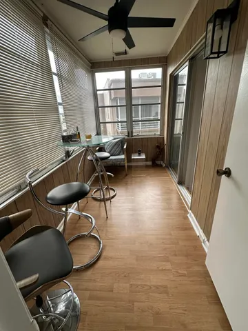 a room with furniture and a window