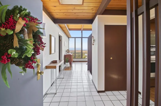 a lobby with flowers and flowers