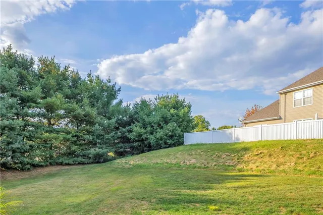 a view of a lake with a big yard