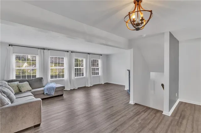 a view of livingroom with furniture wooden floor and window