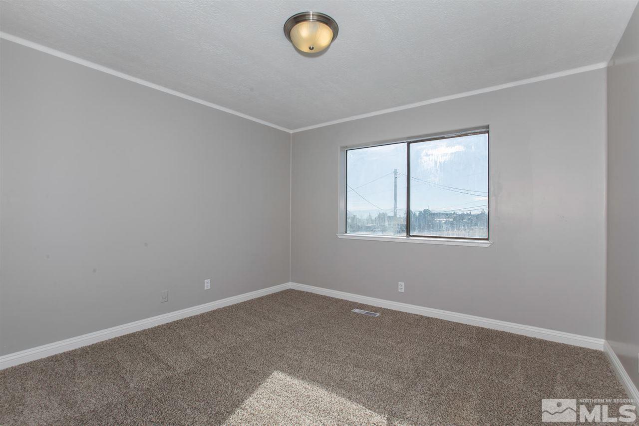 425 Hoge Road Reno, NV 89506 - Photo 13 of 25 an empty room with windows