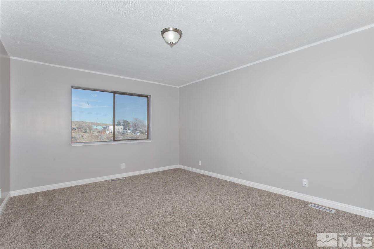 425 Hoge Road Reno, NV 89506 - Photo 14 of 25 an empty room with a window