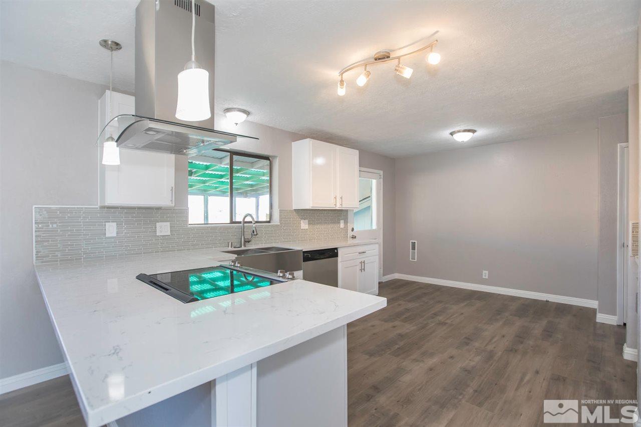 425 Hoge Road Reno, NV 89506 - Photo 6 of 25 a kitchen with a table and chairs